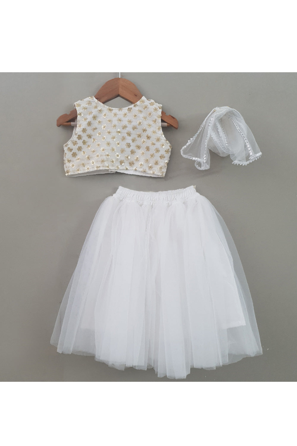 White Embroidered Sleeveless Top With Net Lehenga Set