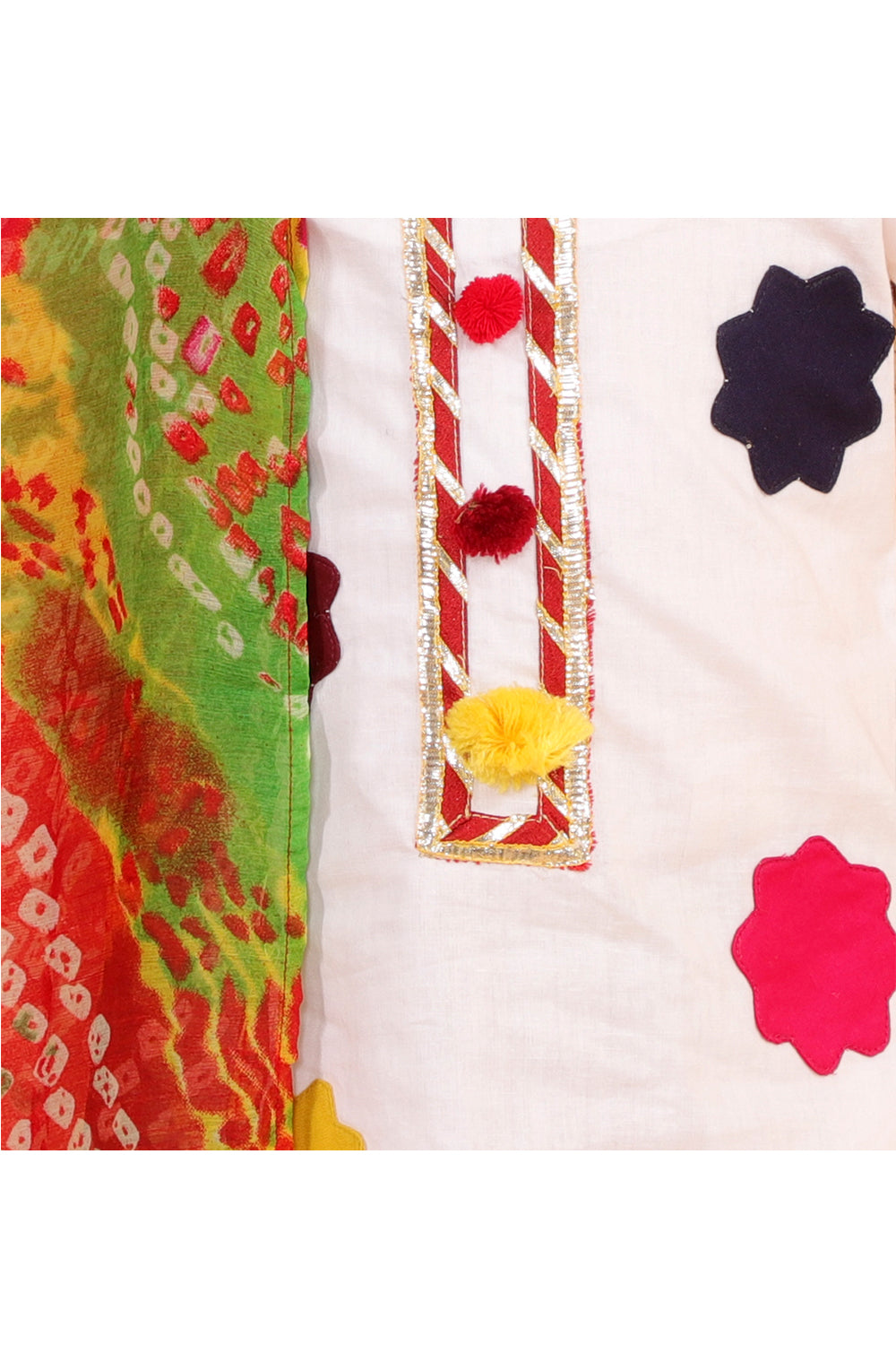 White kurta with colorful patches and dhoti with bandhani dupatta