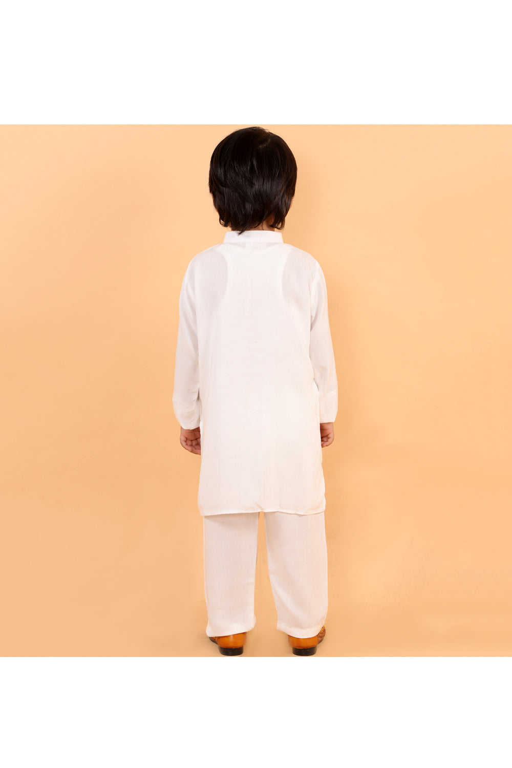 White holi kurta with colorful patches and white pyjama