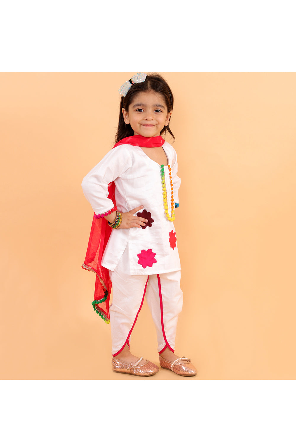 White kurta with colorful patches and dhoti with colorful dupatta