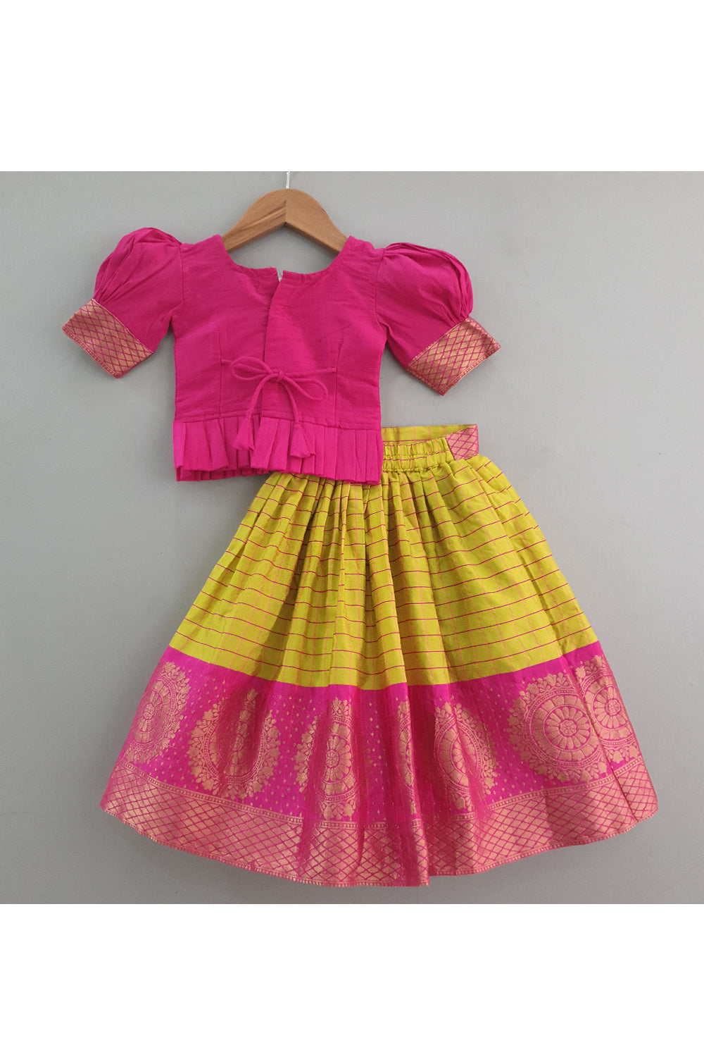 Fuchsia pink hand embroidered peplum choli with lehenga