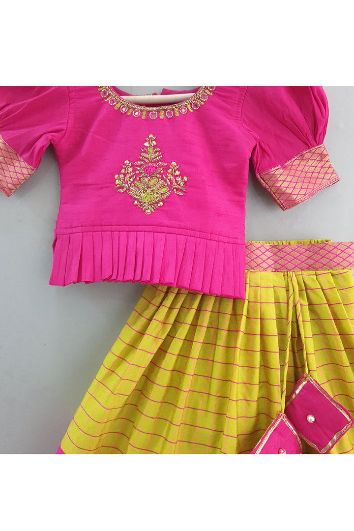 Fuchsia pink hand embroidered peplum choli with lehenga