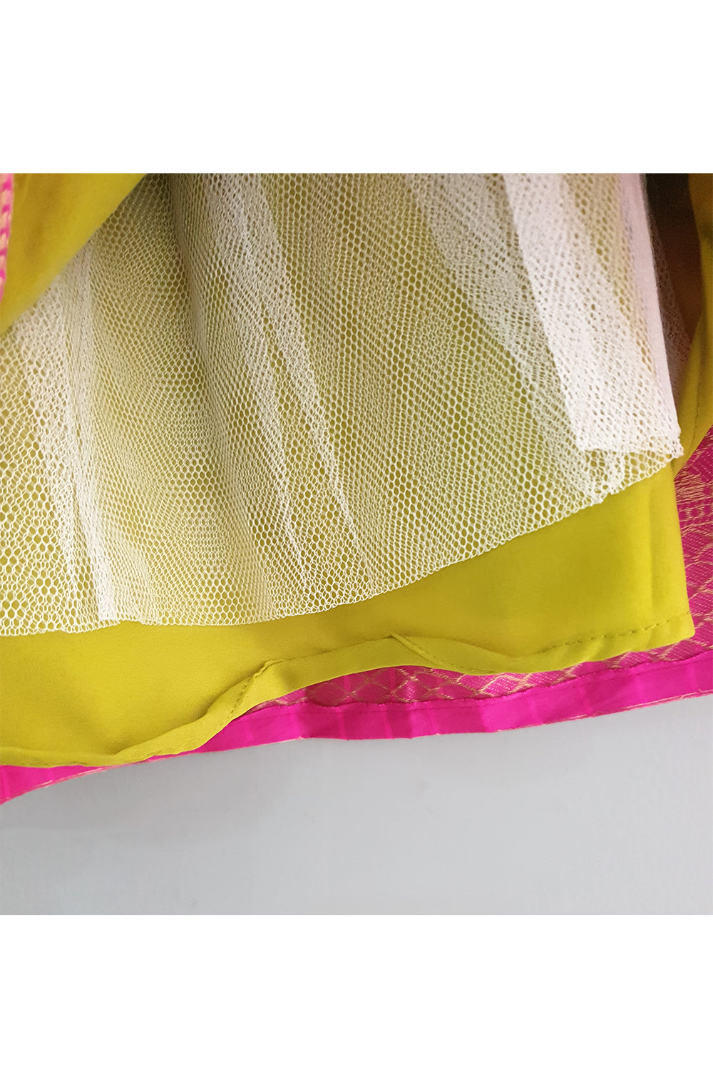 Fuchsia pink hand embroidered peplum choli with lehenga