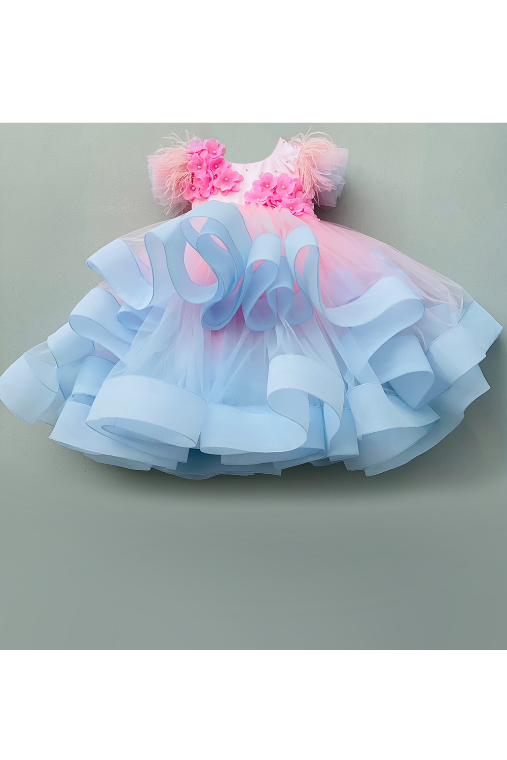 Shop from our latest designer collection of kids gowns. Customised children's designer gowns are made to measurements. Worldwide delivery. Free Shipping*