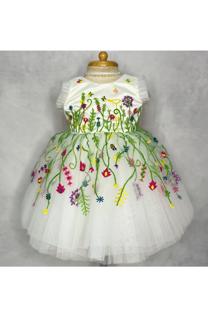 White hand embroidered net gown