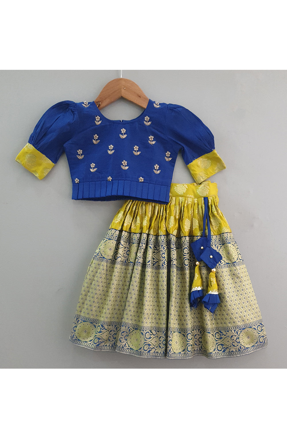 Dark blue hand embroidered peplum choli with banarasi lehenga
