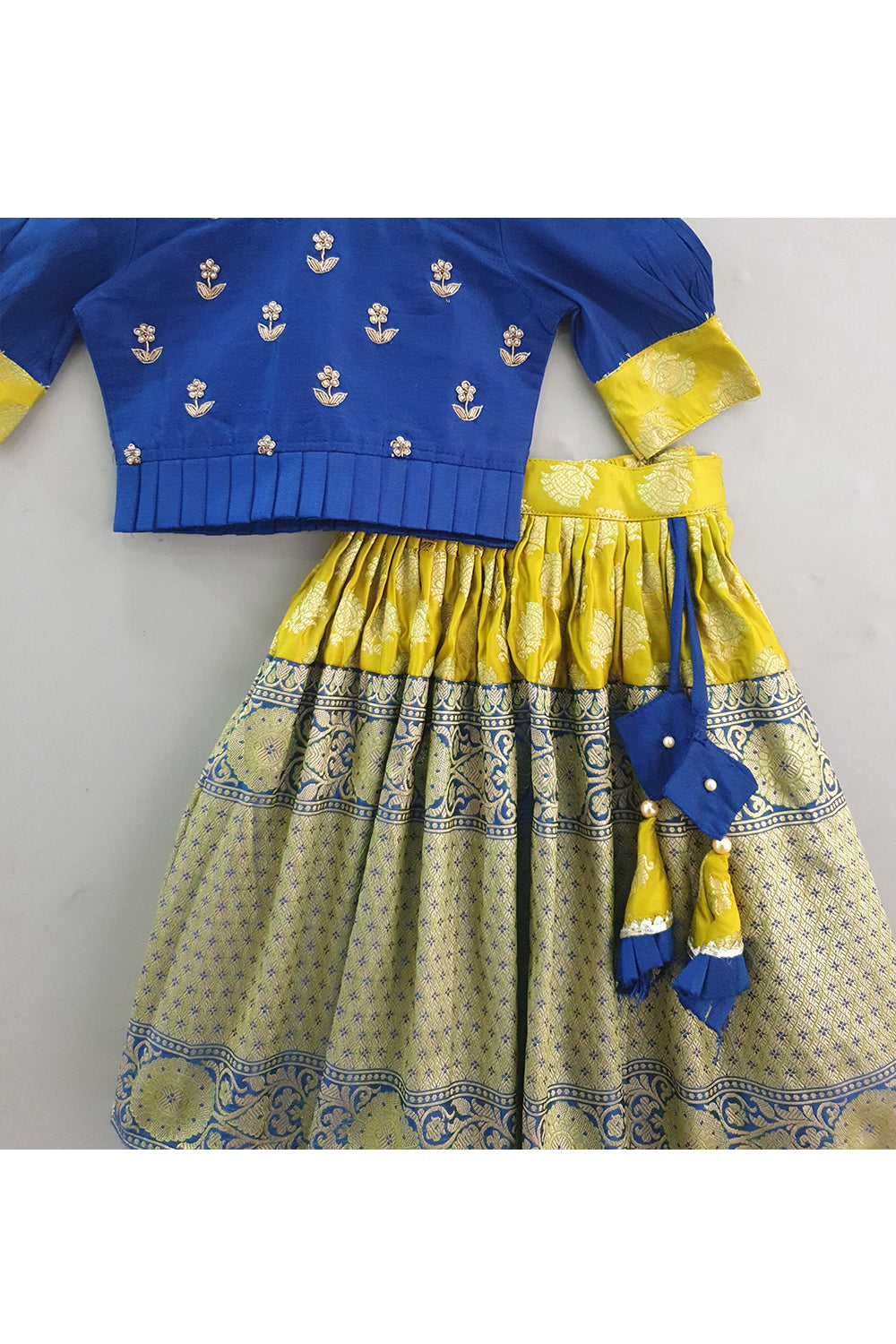 Dark blue hand embroidered peplum choli with banarasi lehenga