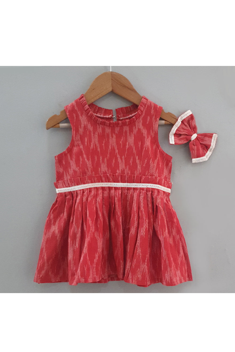 Red ikat printed with lace detailing dress with hair accessory