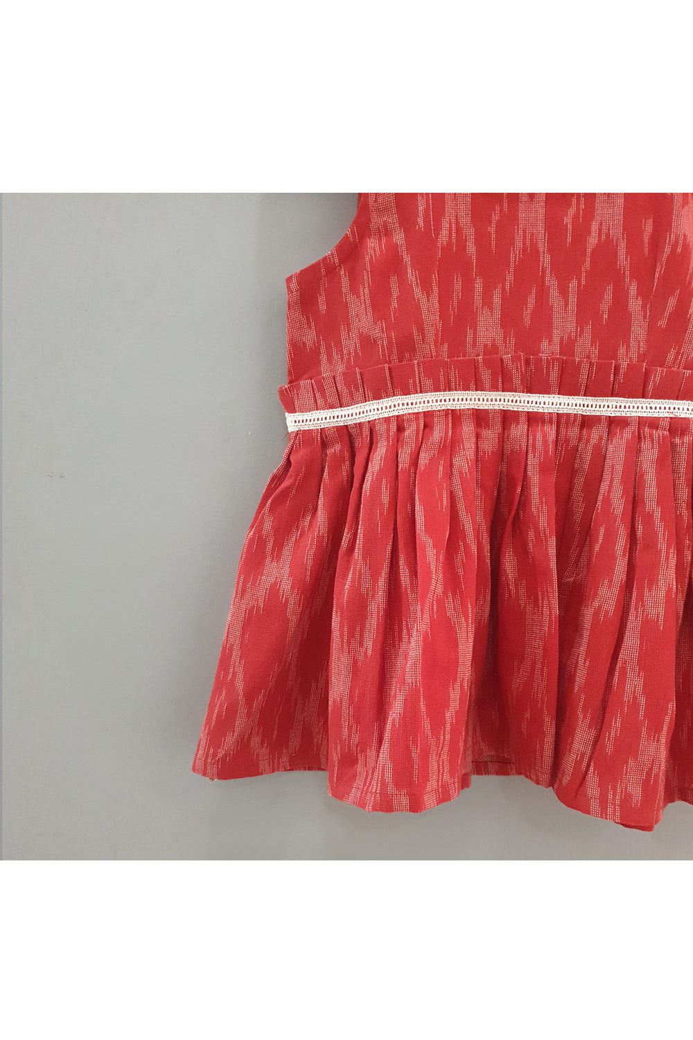 Red ikat printed with lace detailing dress with hair accessory