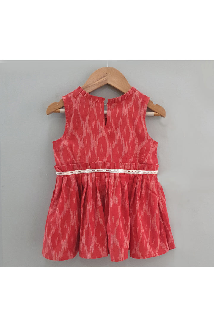 Red ikat printed with lace detailing dress with hair accessory