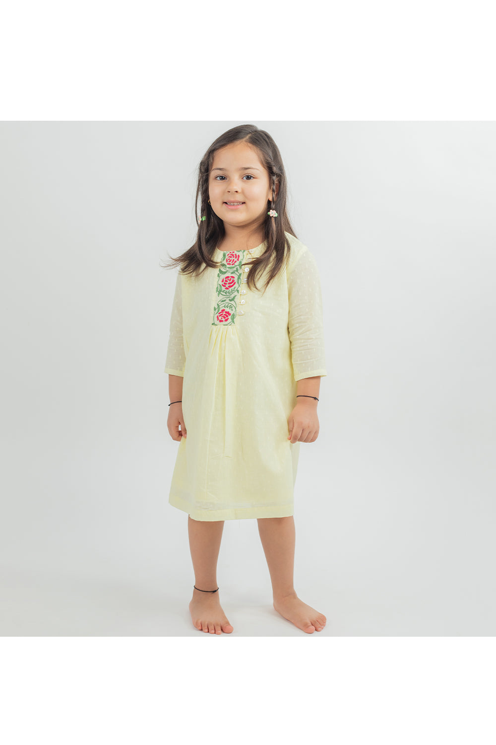 Yellow hand embroidered yoke dress