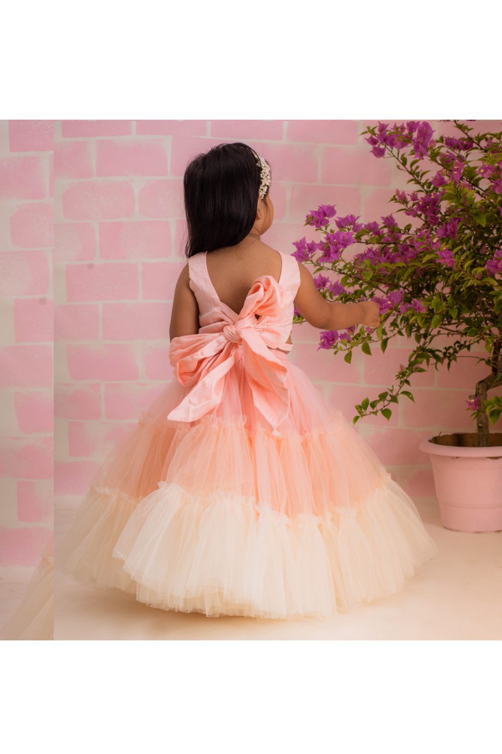 Peach Pearl Embroidered Tie-Knot Top With Tiered Lehenga Set