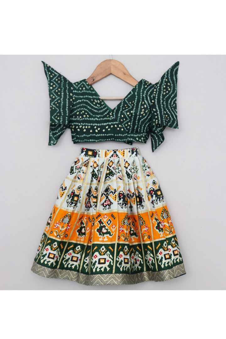 Bottle Green Bandhani Printed Top With Patola Printed Lehenga Set