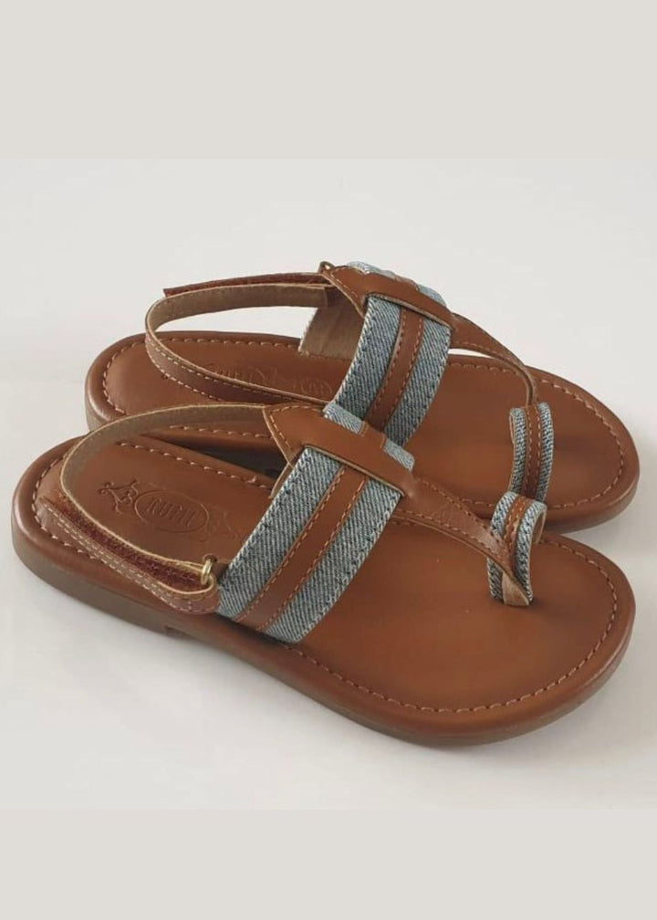 Denim and tan kolhapuri flats