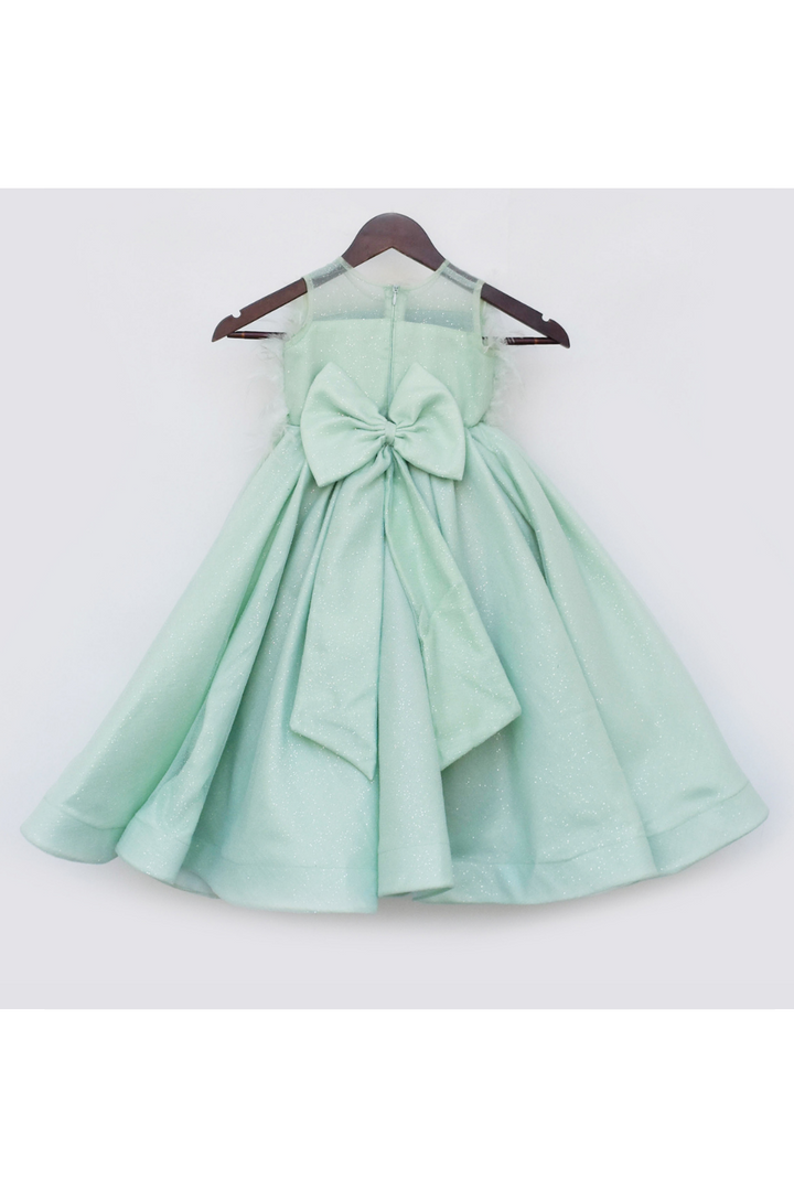 Pista Green Feathers And Bow Embellished Net Gown