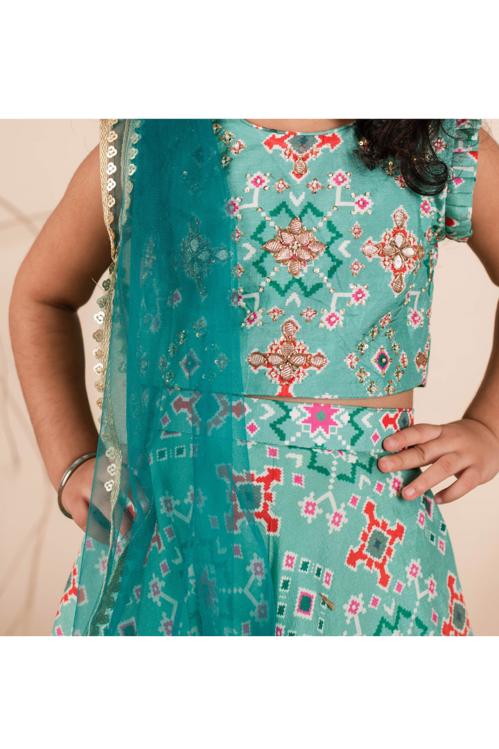 Green Ikkat Printed And Stones Embellished Top With Lehenga Set