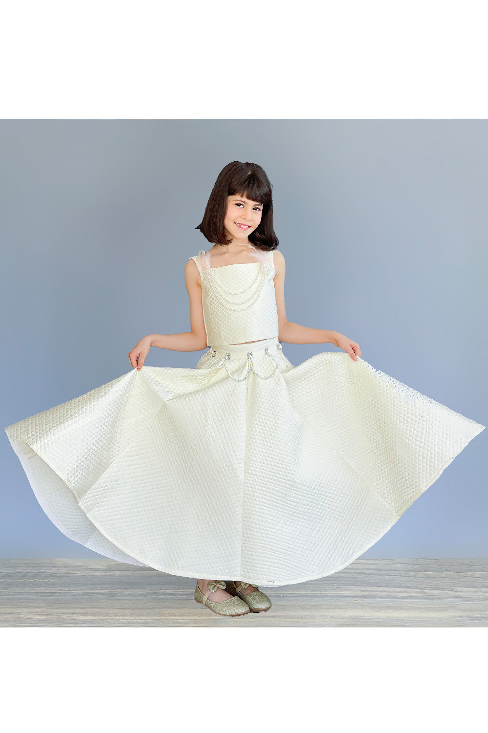 Off White Pearl Detailing Sleeveless Top With Embellished Cape And Lehenga Set