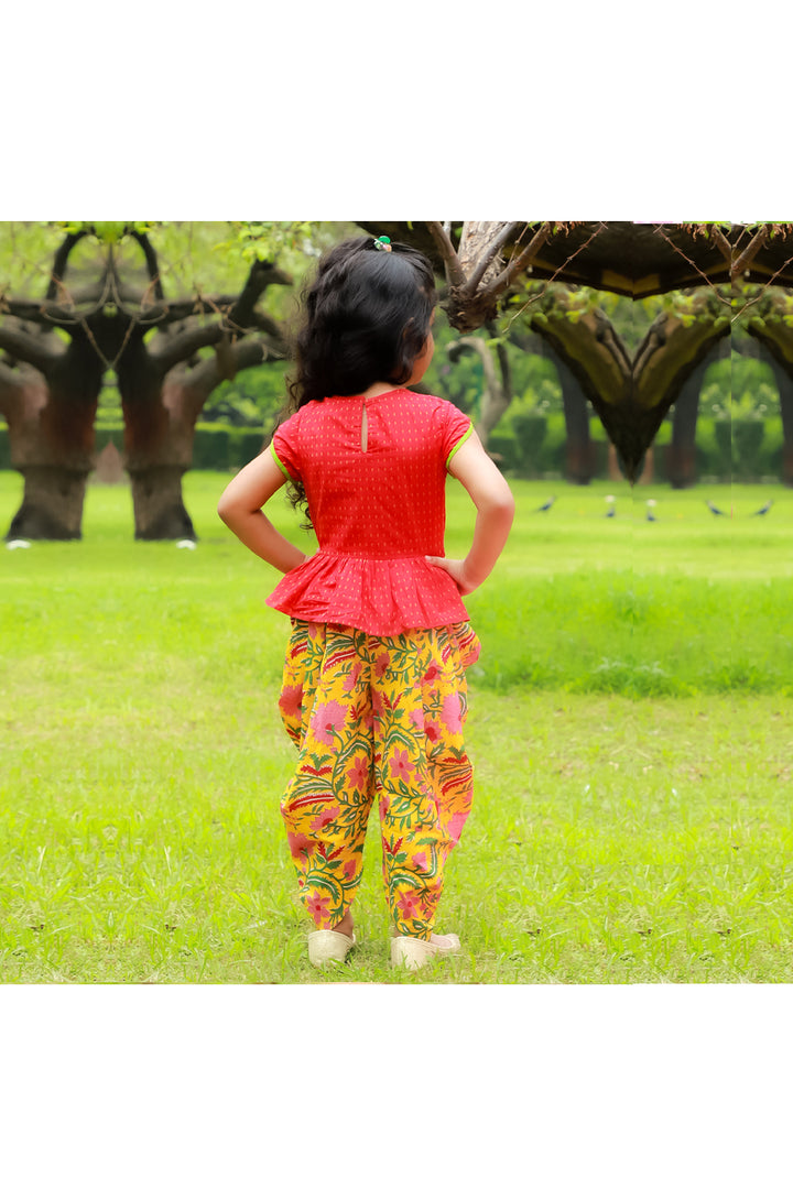 Red peplum style top yellow floral printed dhoti