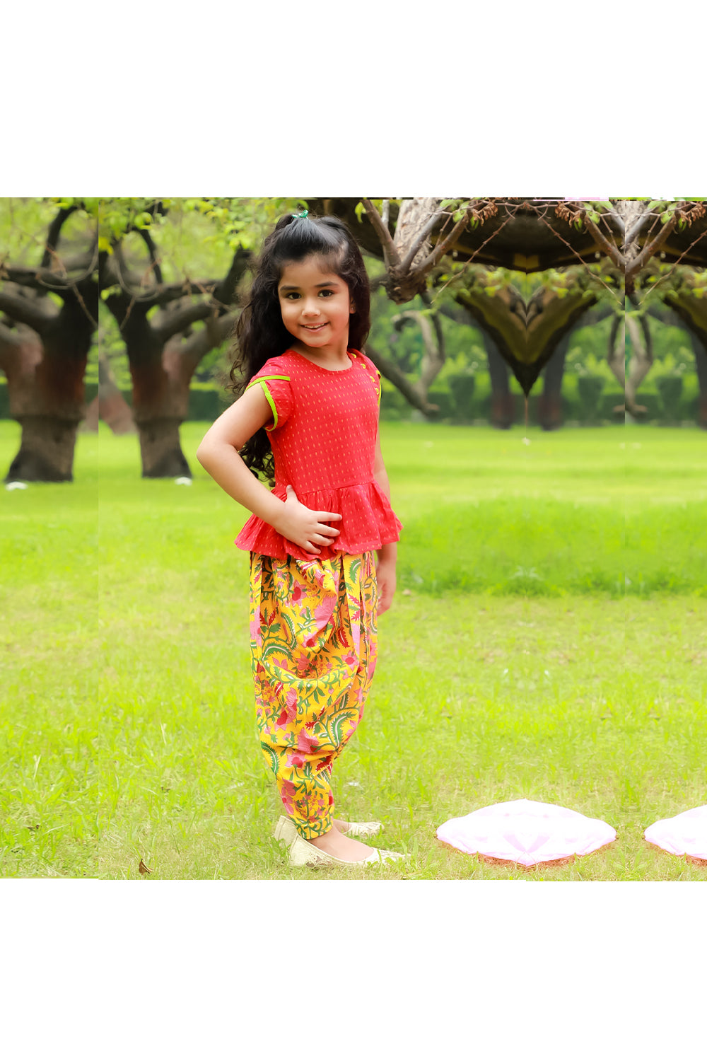 Red peplum style top yellow floral printed dhoti