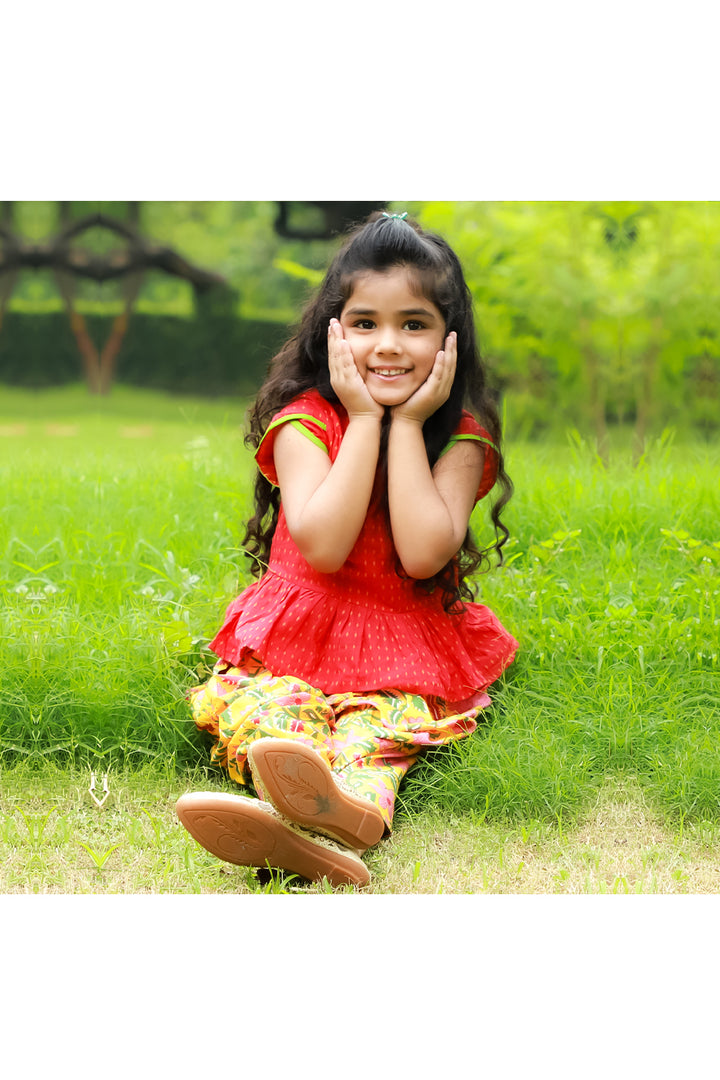 Red peplum style top yellow floral printed dhoti
