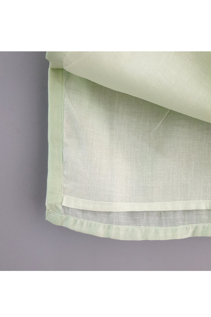 Light green kurta and straight pyjama with embroidered jacket
