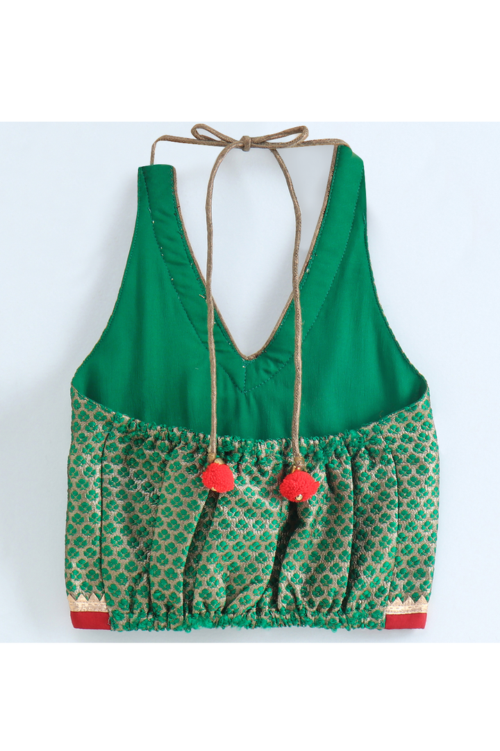 Green brocade halter neck top and red printed palazzo