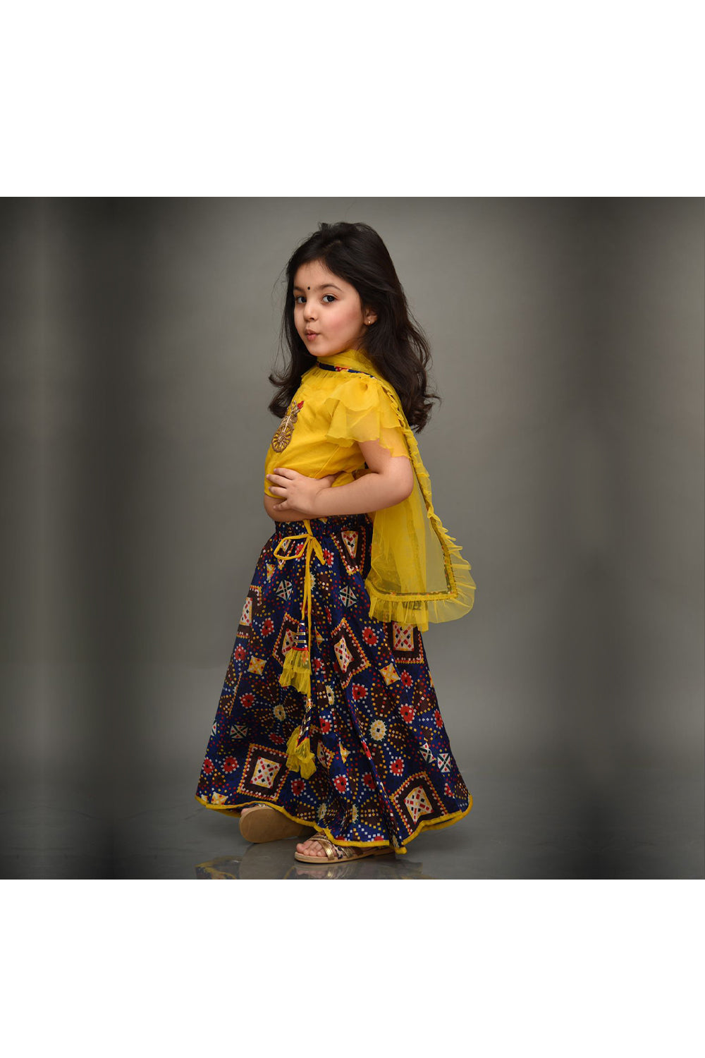 Yellow zari work patch choli with ink blue printed lehenga