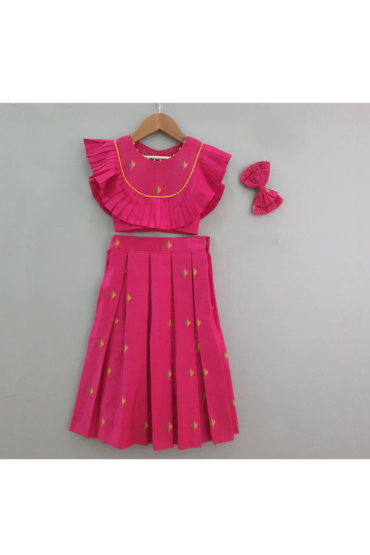 Magenta pink booti frill detailing top and pleated skirt with hair accessory