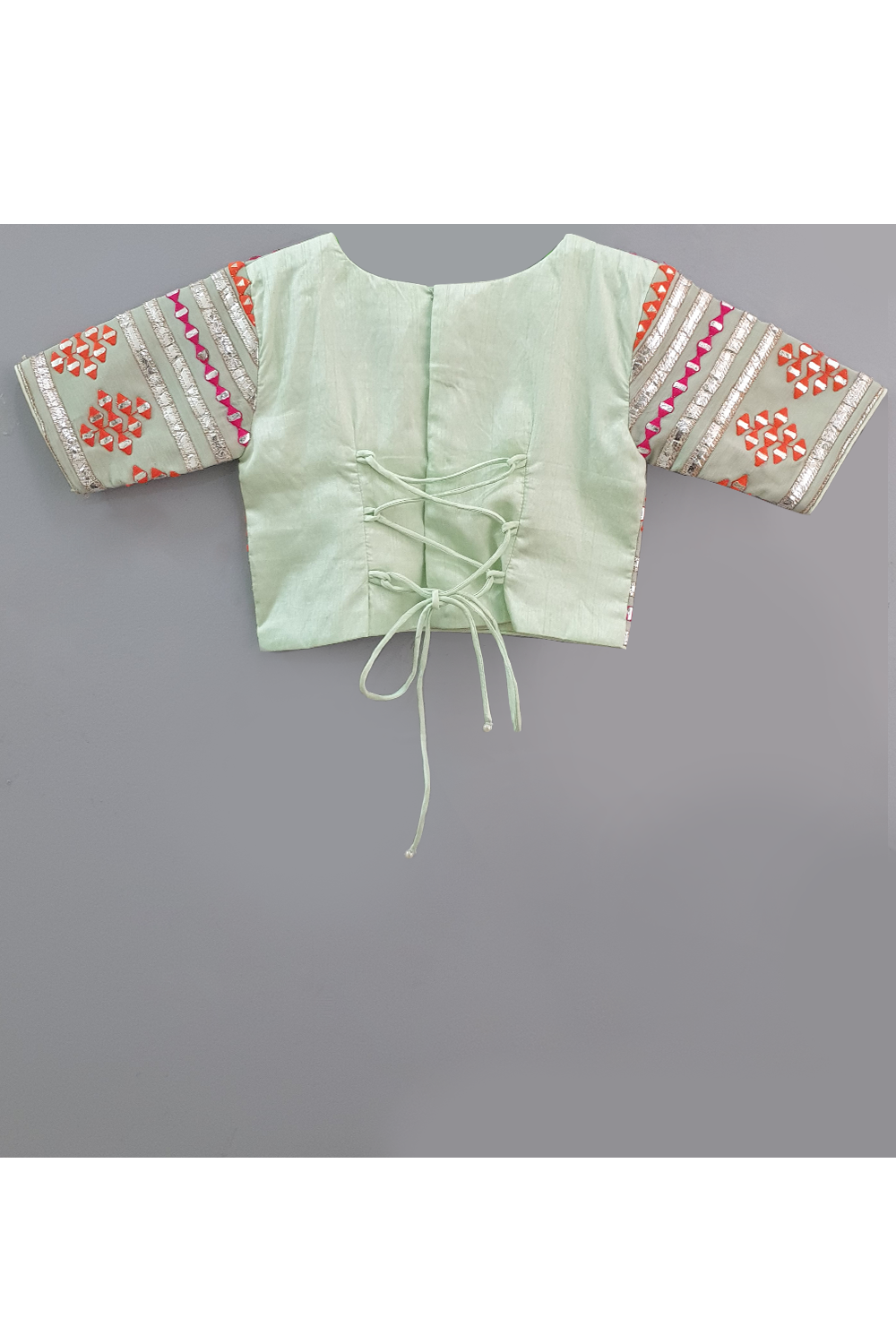 Sea green embroidered choli and lehenga with frilly dupatta