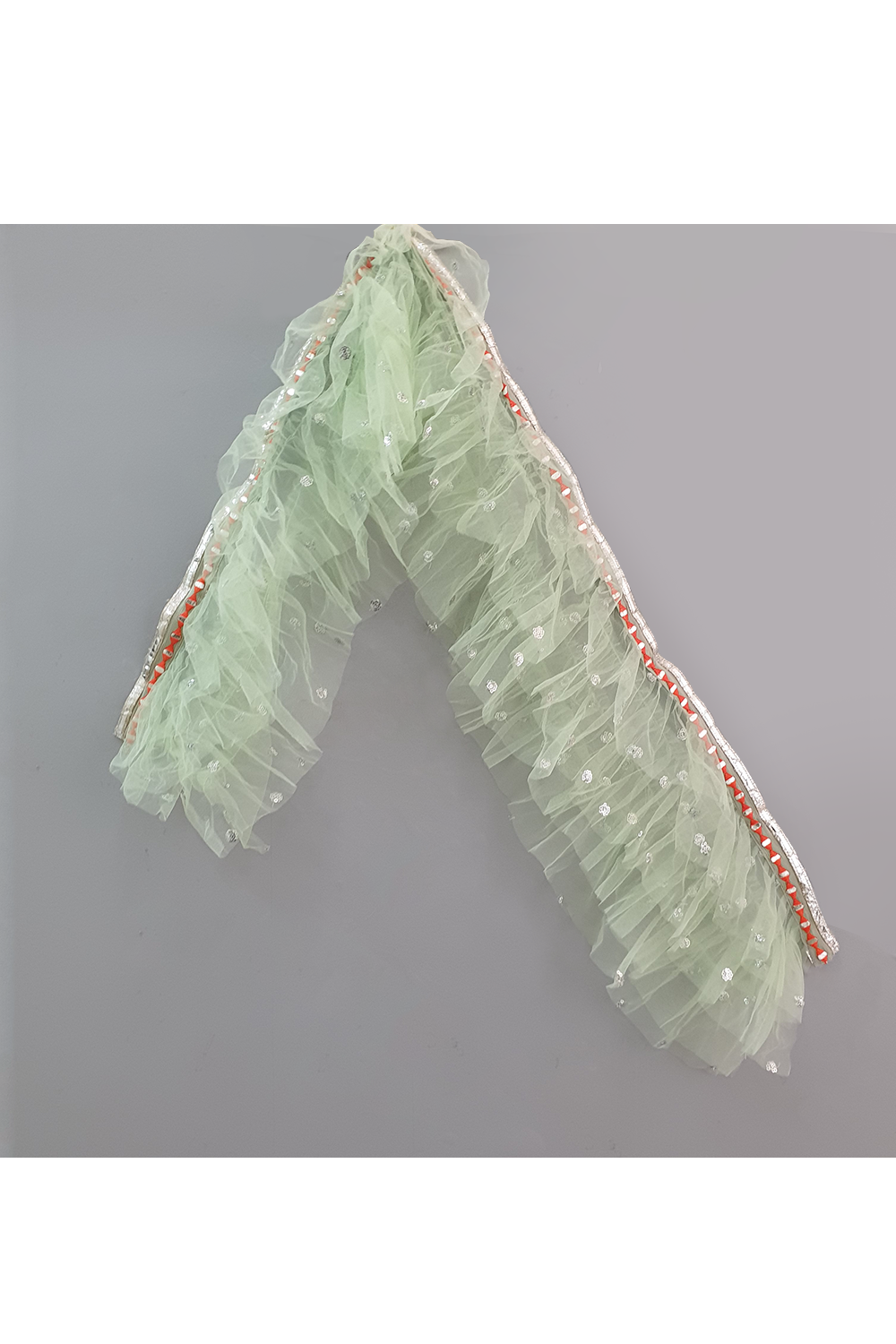 Sea green embroidered choli and lehenga with frilly dupatta