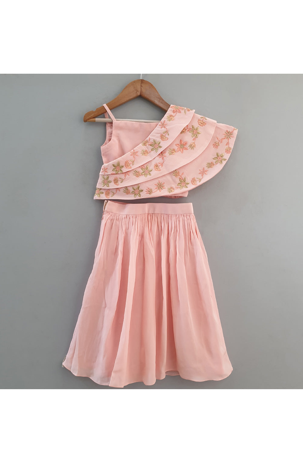 Peach Sleeveless Top With Embroidered Cape And Skirt Set