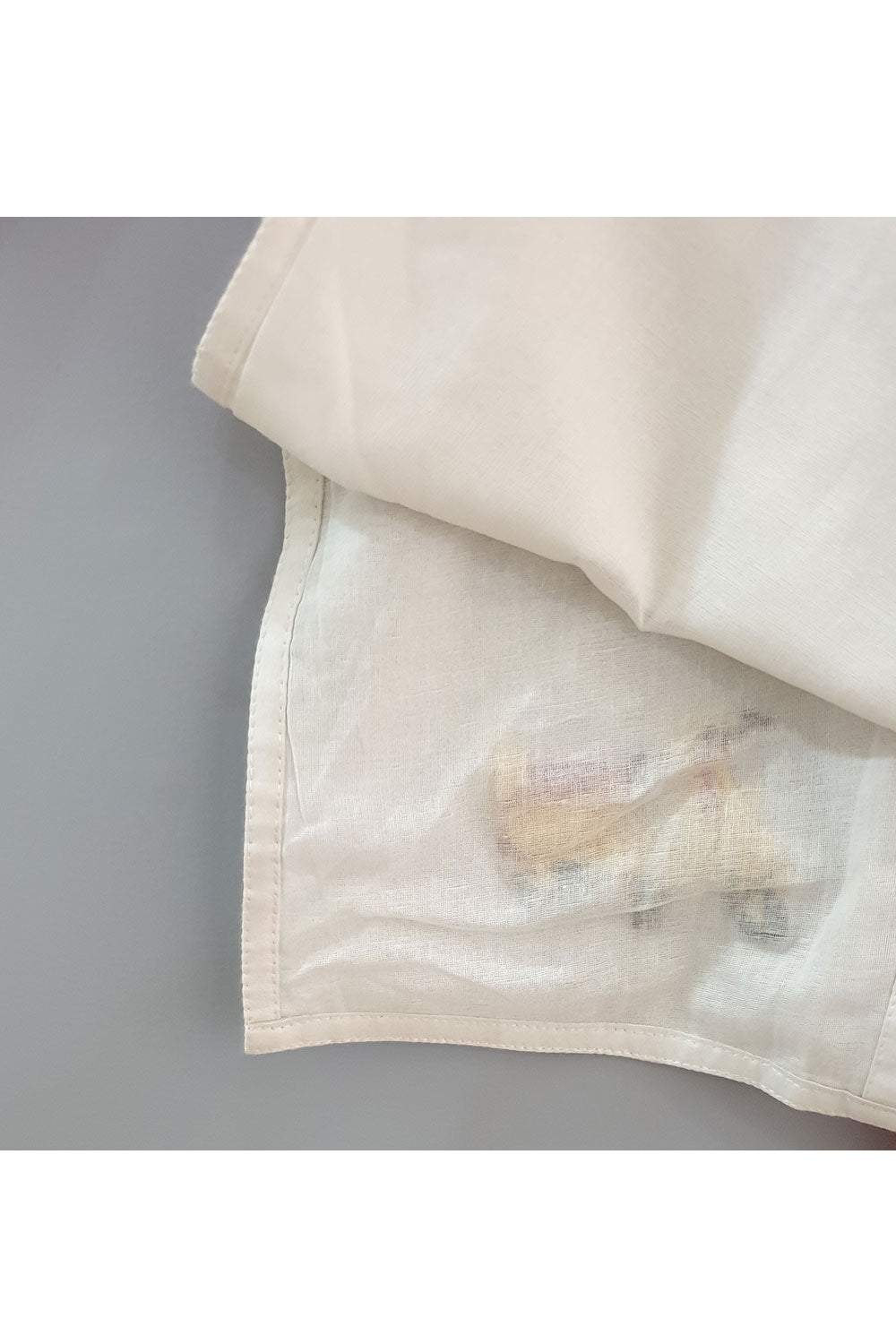 Off white scooter embroidered motif kurta and red dhoti