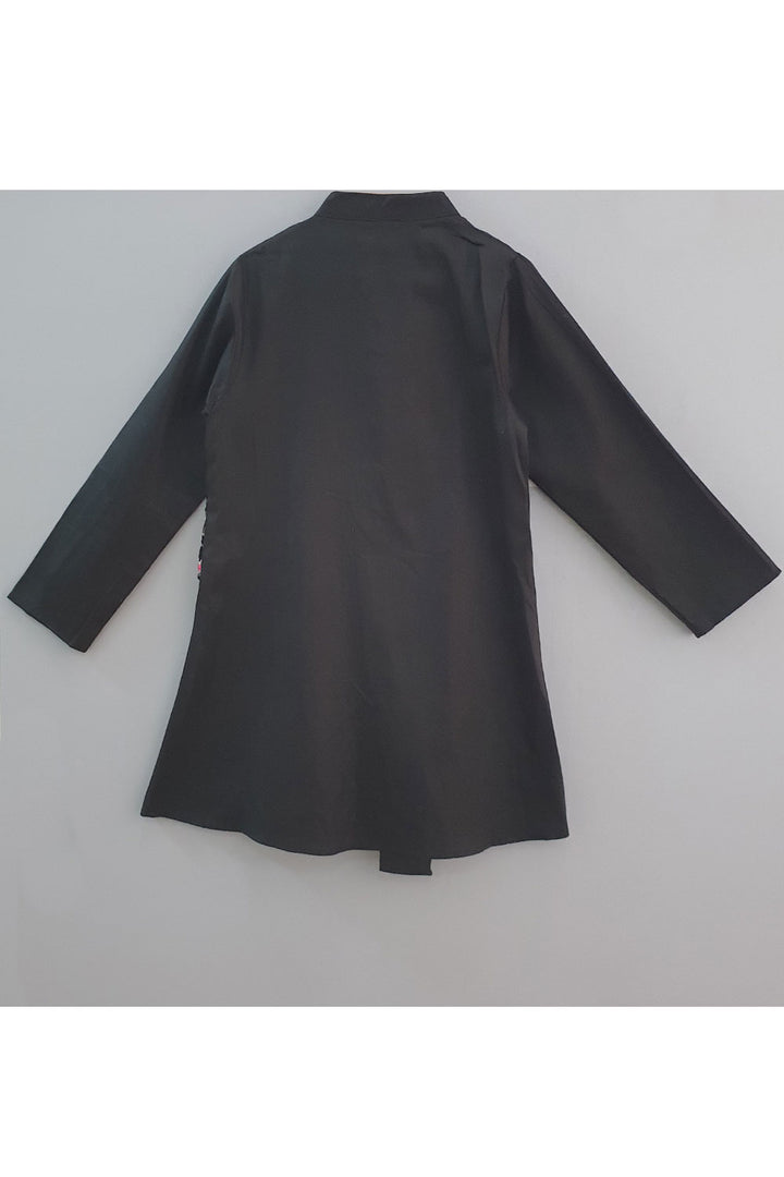 Black embroidered kurta and peach patiala pants