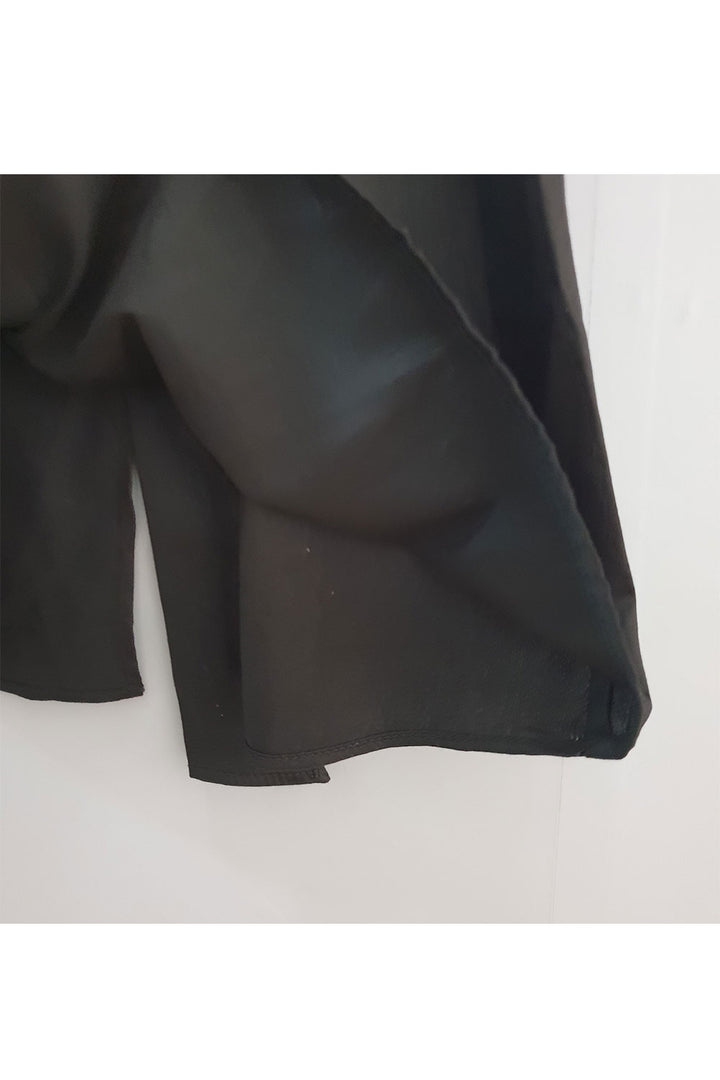 Black embroidered kurta and peach patiala pants
