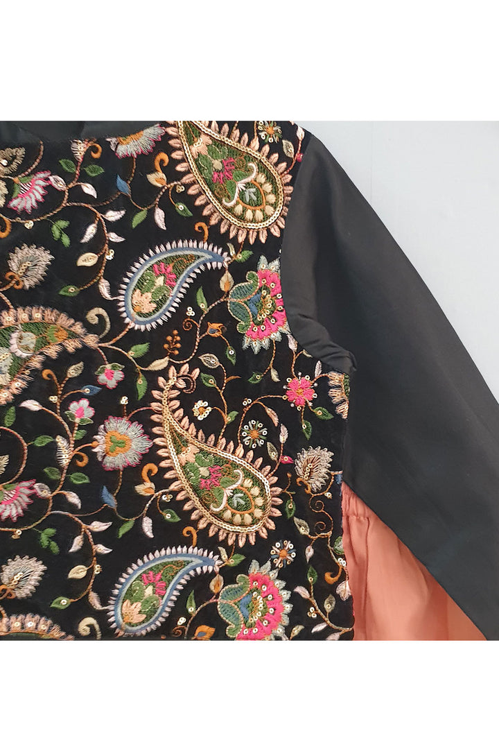 Black embroidered kurta and peach patiala pants