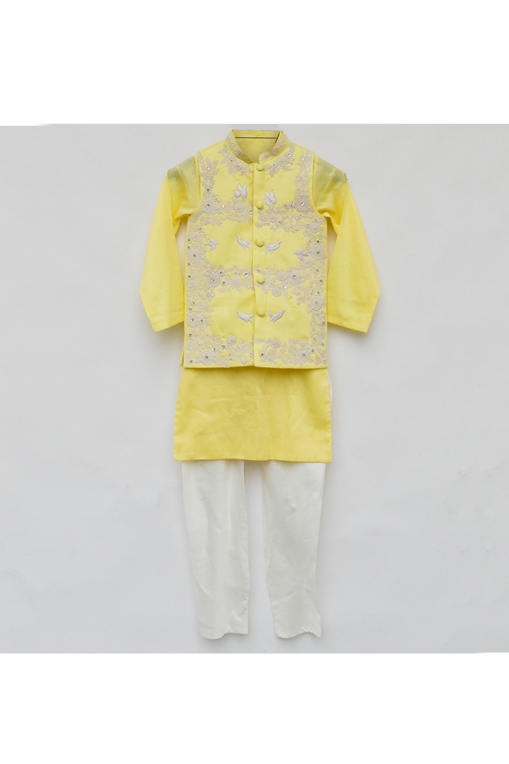 Yellow silk kurta with nehru jacket and white pyjama