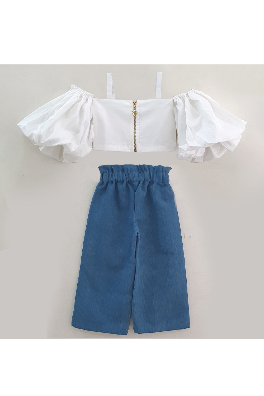 White top and wide jeans with hairband