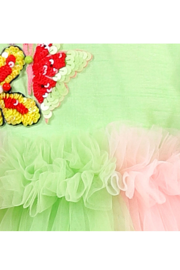 Green and pink butterfly dress with trail