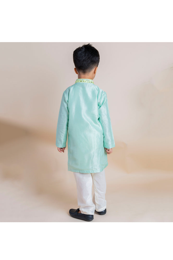 Mirror work kurta with white churidar