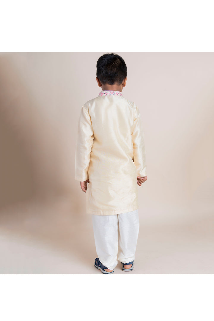 Beige mirror work kurta with white churidar