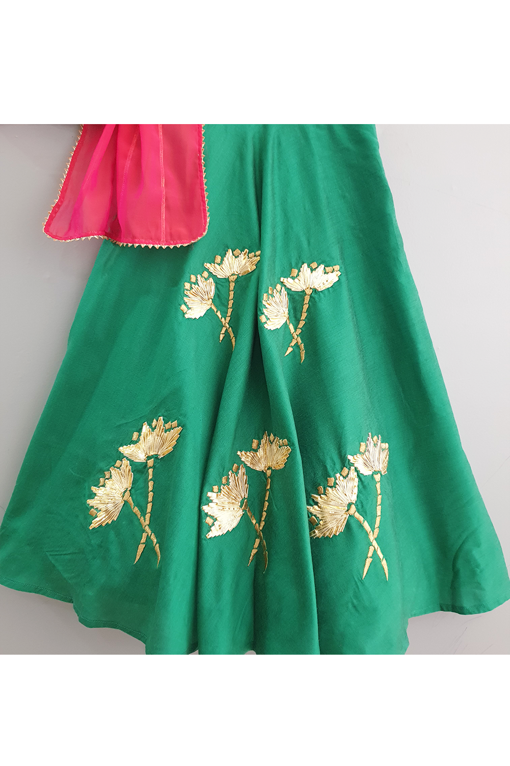 Green lotus embroidered lehenga with fuchsia attached dupatta blouse