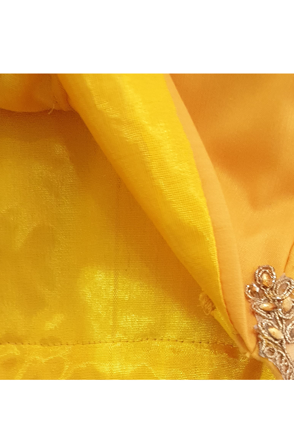 Yellow choli and off white lehenga with attached dupatta