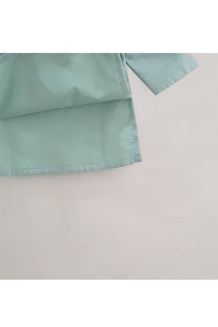 Pastel green sequin pocket kurta with churidar