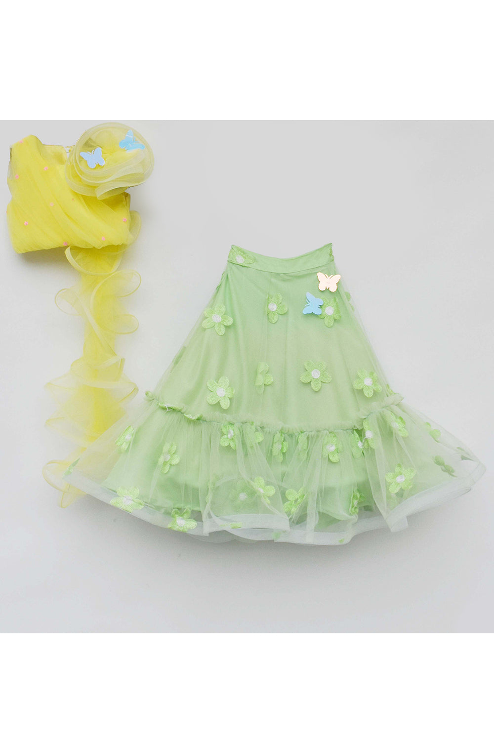 Flowers embroidered net lehenga and top with attached dupatta