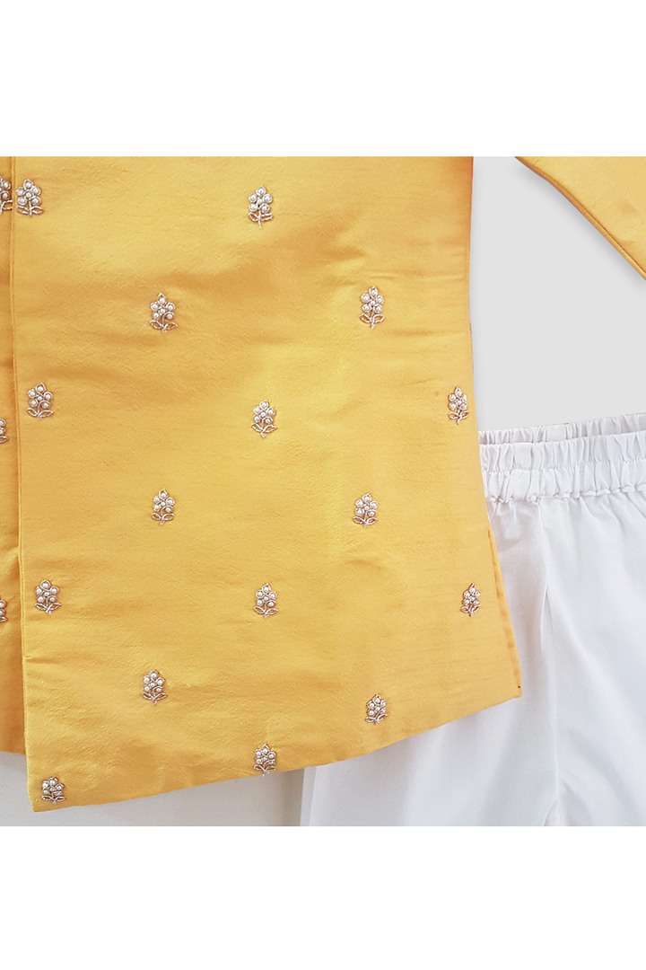 Yellow pearl embroidered kurta with white pyjama