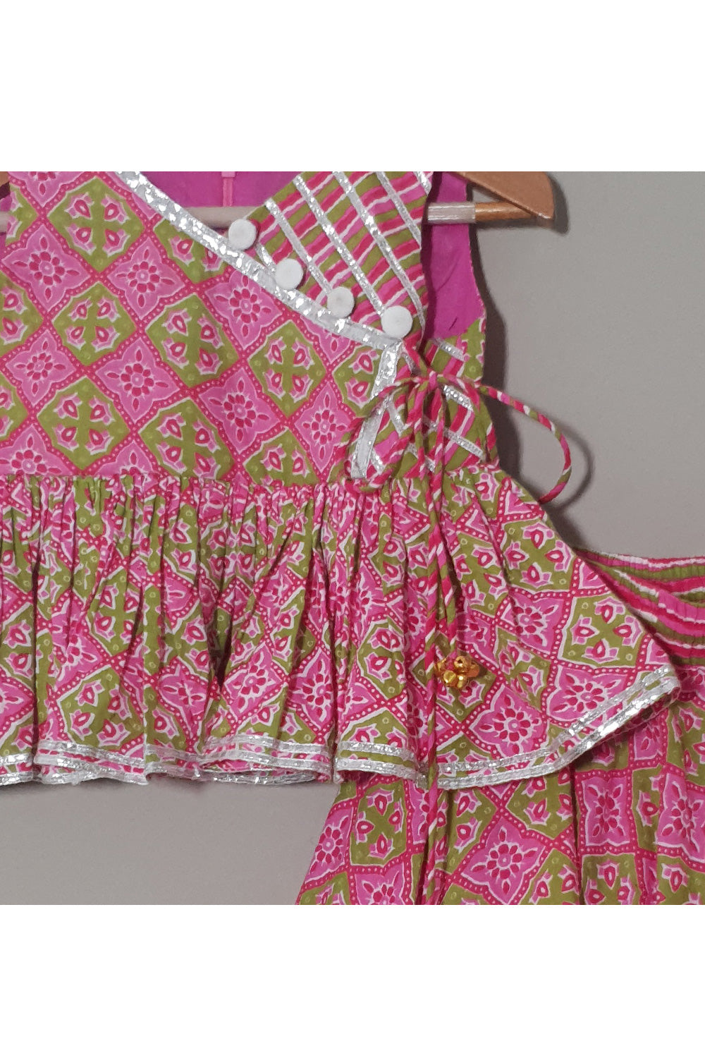 Pink Printed And Lace Detailing Peplum Style Top With Lehenga Set