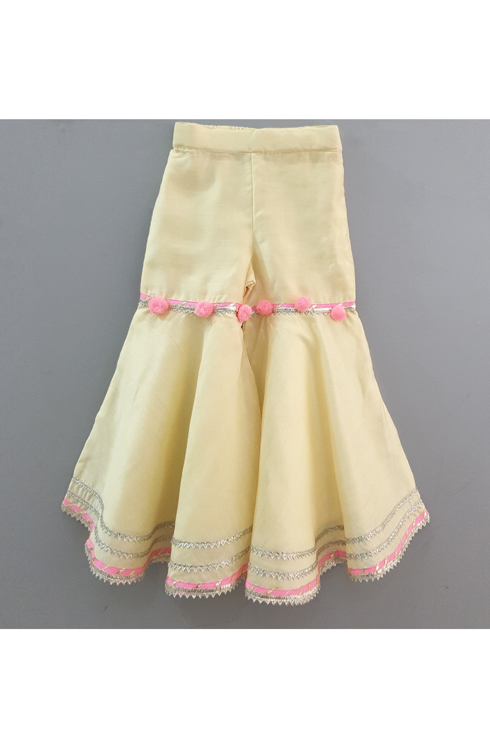 Yellow gota work peplum style kurta with sharara