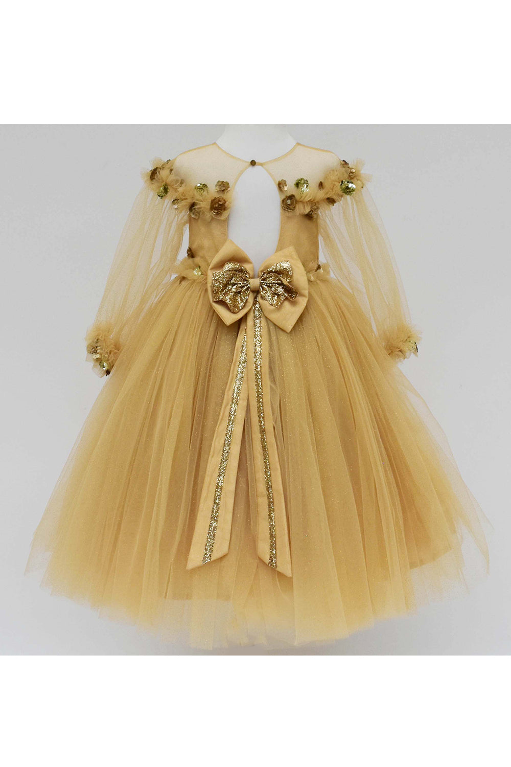 Golden glitter gown with flowers and butterflies