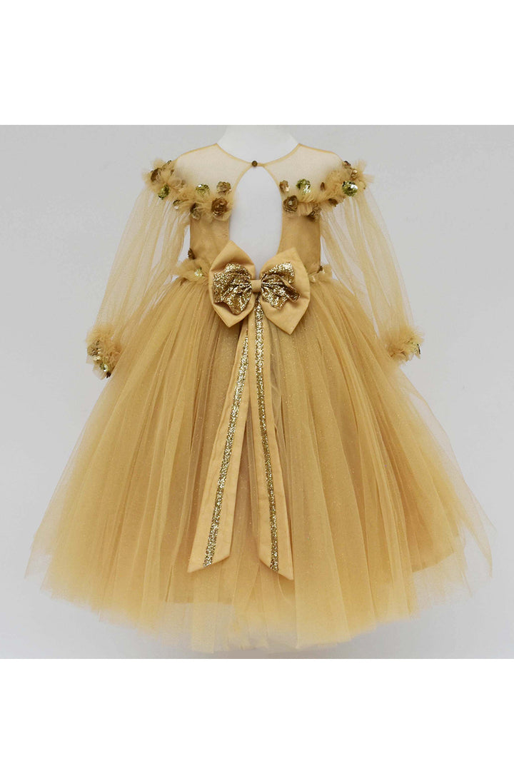 Golden glitter gown with flowers and butterflies