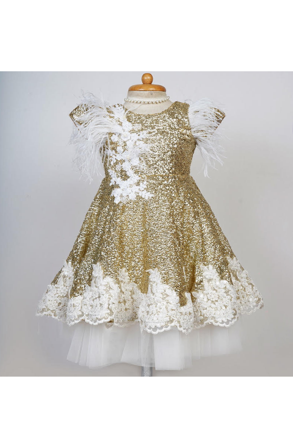Shop from our latest designer collection of kids gowns. Customised children's designer gowns are made to measurements. Worldwide delivery. Free Shipping*